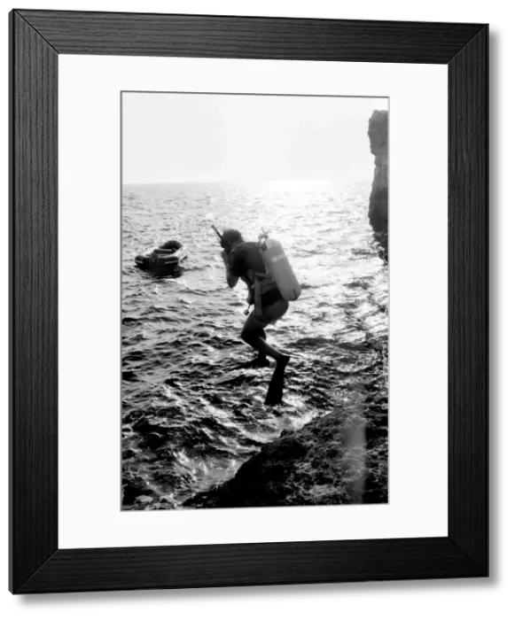 Framed Print : Diver jumping into the sea off the coast of Malta Framed Print : Diver jumping into the sea off the coast of Malta
