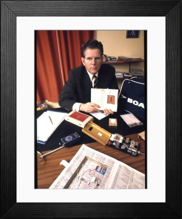 Framed Print : Security expert with latest spy kit Framed Print : Security expert with latest spy kit