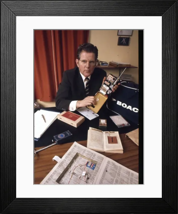 Framed Print : Security expert with latest spy kit Framed Print : Security expert with latest spy kit