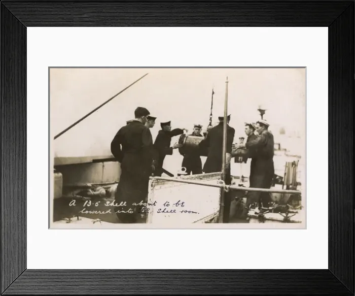 Framed Print : HMS Marlborough - Lowering a 13. 5 inch shell into shell room Framed Print : HMS Marlborough - Lowering a 13. 5 inch shell into shell room