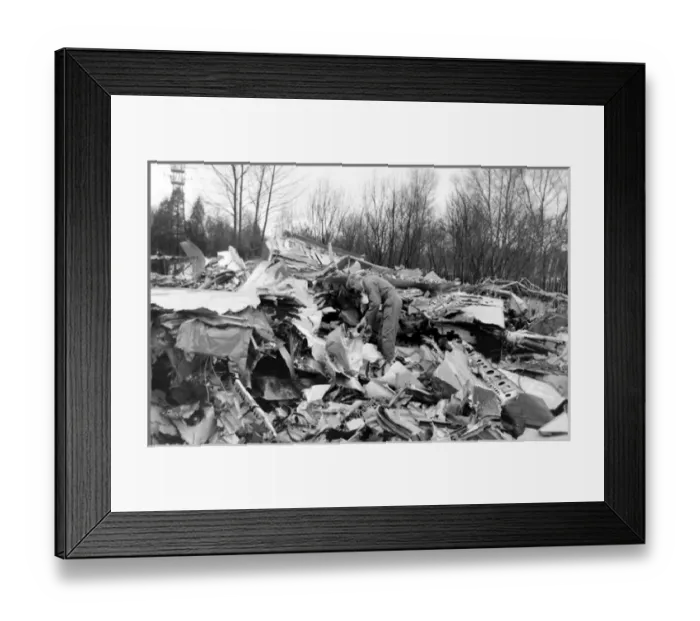 Framed Print : Air crash investigator examining debris Framed Print : Air crash investigator examining debris