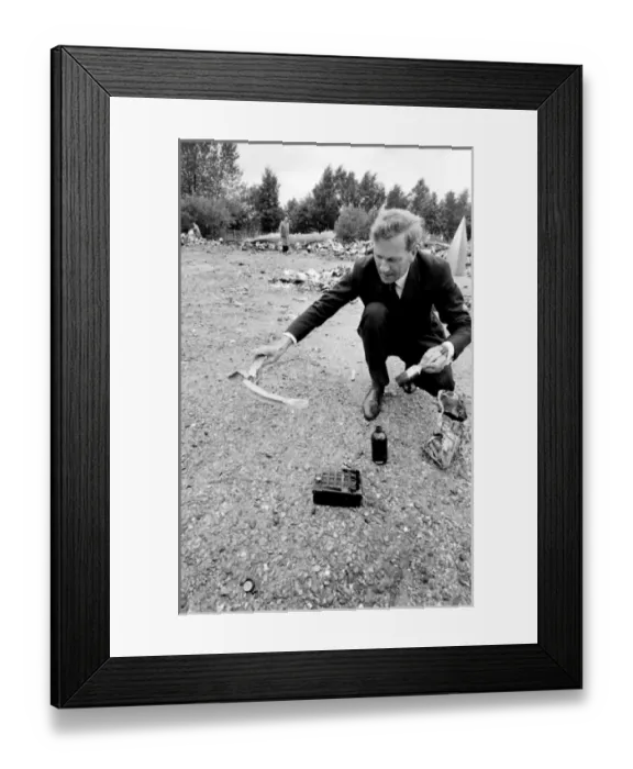 Framed Print : Air crash investigator examining debris Framed Print : Air crash investigator examining debris