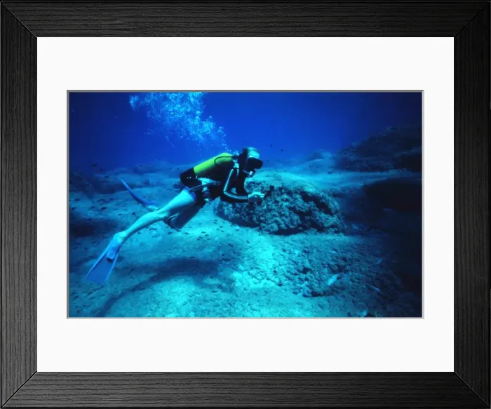 Framed Print : Diver on the seabed off the coast of Malta