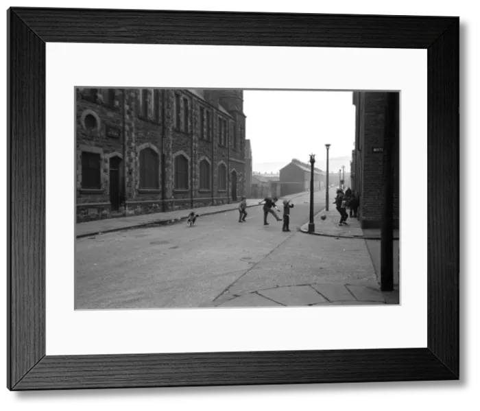 Framed Print : Boys playing football in a street, Belfast, Northern Ireland Framed Print : Boys playing football in a street, Belfast, Northern Ireland