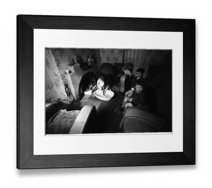 Framed Print : Woman bathing baby, Falls Road, Northern Ireland Framed Print : Woman bathing baby, Falls Road, Northern Ireland