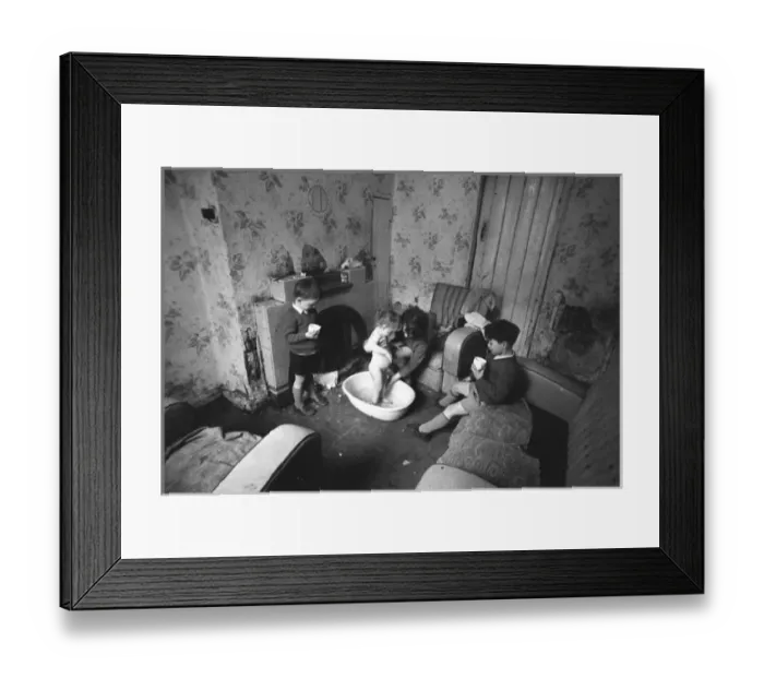 Framed Print : Woman bathing baby, Falls Road, Northern Ireland Framed Print : Woman bathing baby, Falls Road, Northern Ireland