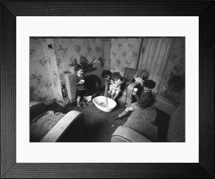 Framed Print : Woman bathing baby, Falls Road, Northern Ireland Framed Print : Woman bathing baby, Falls Road, Northern Ireland