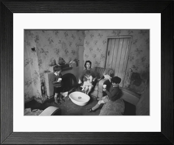 Framed Print : Woman bathing baby, Falls Road, Northern Ireland Framed Print : Woman bathing baby, Falls Road, Northern Ireland