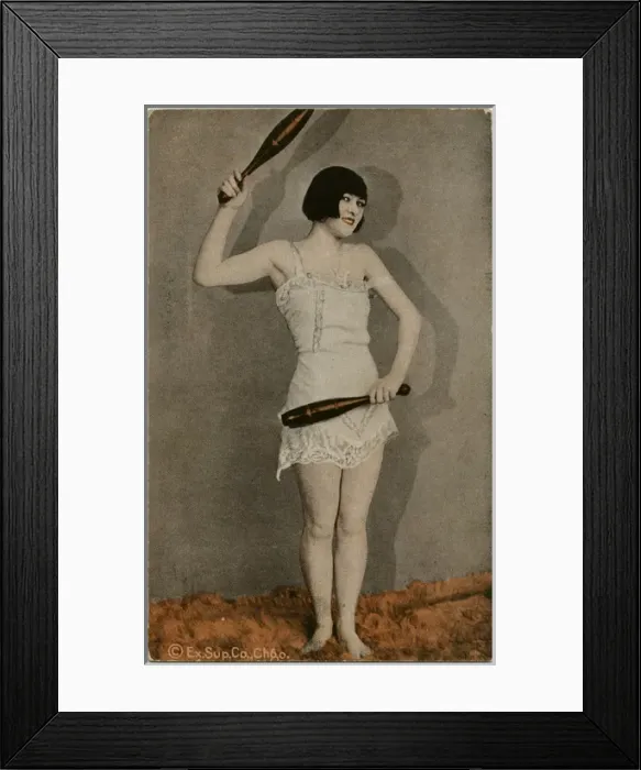 Framed Print : Sporty American Girl holding two exercise clubs Framed Print : Sporty American Girl holding two exercise clubs