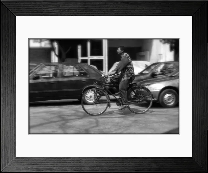 Framed Print : Man on bike in Cairo, Egypt Framed Print : Man on bike in Cairo, Egypt
