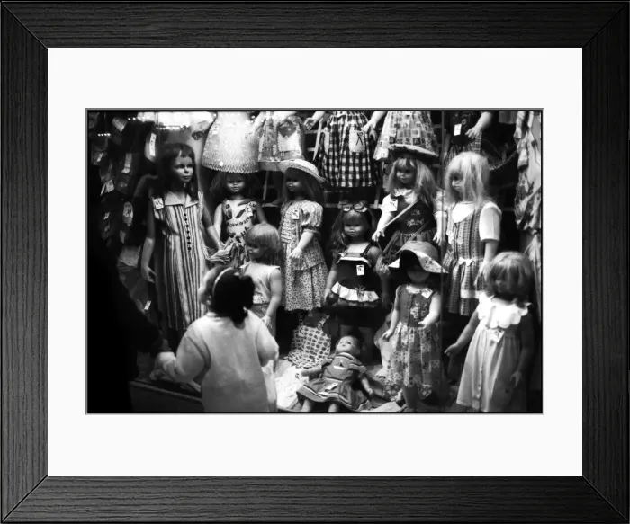Framed Print : Little girl and dress and doll shop window Alexandria, Egypt Framed Print : Little girl and dress and doll shop window Alexandria, Egypt