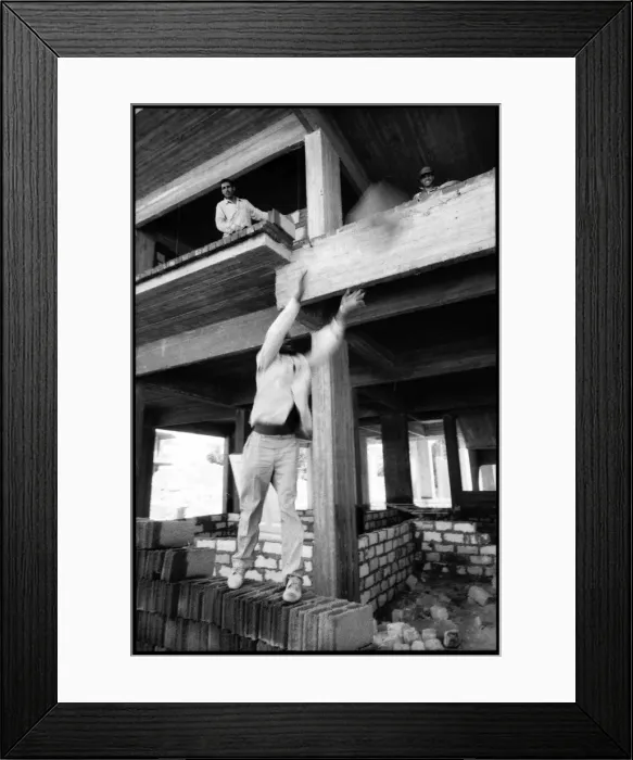 Framed Print : Man throwing building brick Alexandria, Egypt Framed Print : Man throwing building brick Alexandria, Egypt