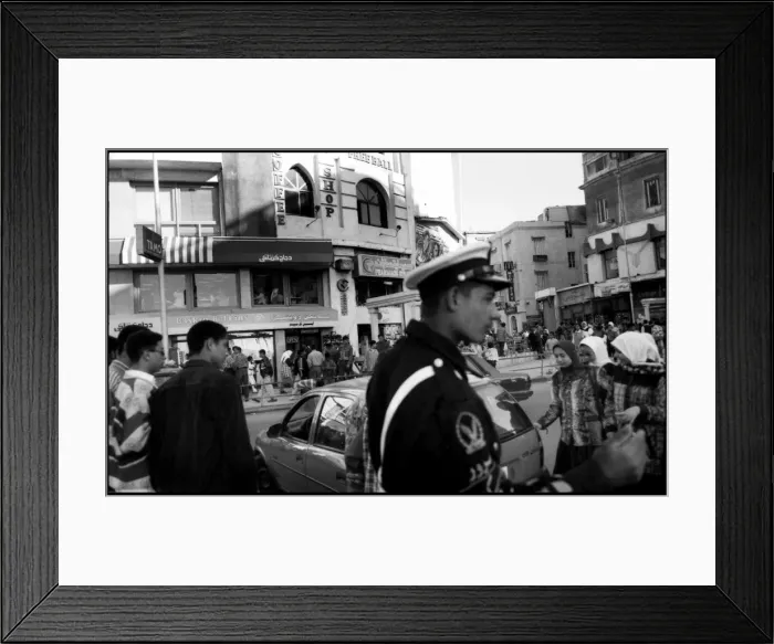 Framed Print : Busy street with policeman Alexandria, Egypt Framed Print : Busy street with policeman Alexandria, Egypt