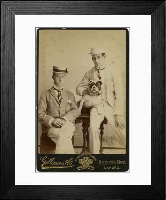 Framed Print : Studio portrait, two young men with bulldog Framed Print : Studio portrait, two young men with bulldog