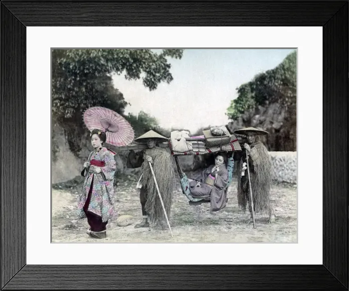 Framed Print : Girl in carrying chair with bearers in grass coats, Japan Framed Print : Girl in carrying chair with bearers in grass coats, Japan