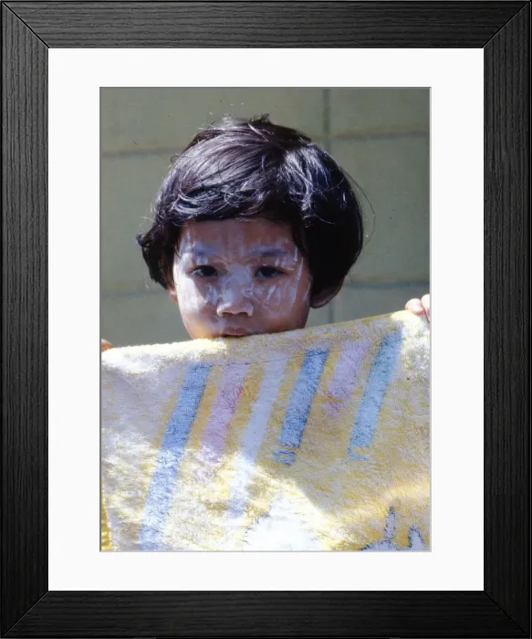 Framed Print : Little child with a yellow towel, Thailand Framed Print : Little child with a yellow towel, Thailand