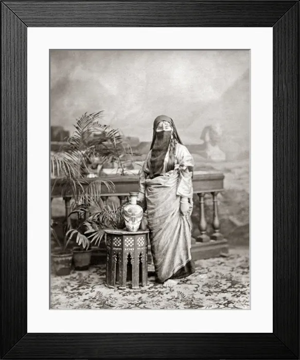 Framed Print : Veiled woman with ornate jug, Egypt, circa 1890
