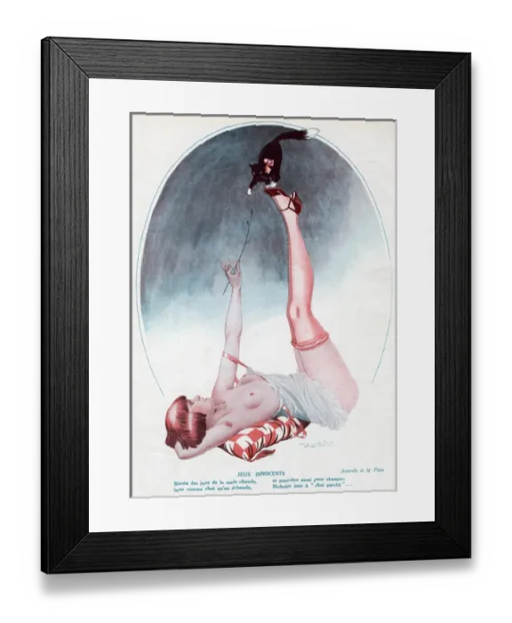 Framed Print : Young woman playing with her kitten Framed Print : Young woman playing with her kitten
