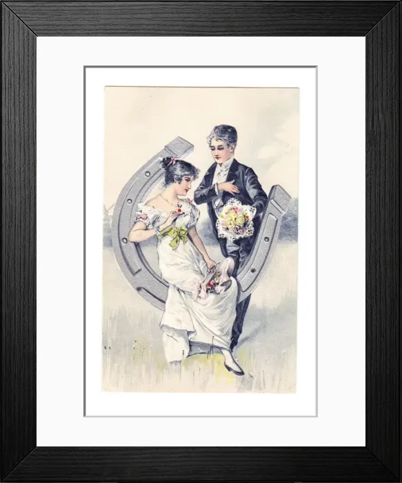 Framed Print : Couple on a horseshoe on a wedding postcard Framed Print : Couple on a horseshoe on a wedding postcard