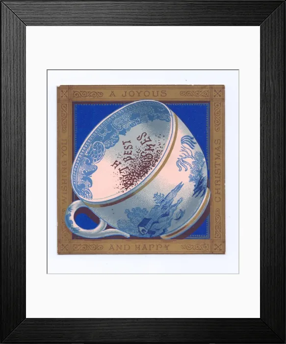 Framed Print : Blue and white china cup on a Christmas postcard Framed Print : Blue and white china cup on a Christmas postcard