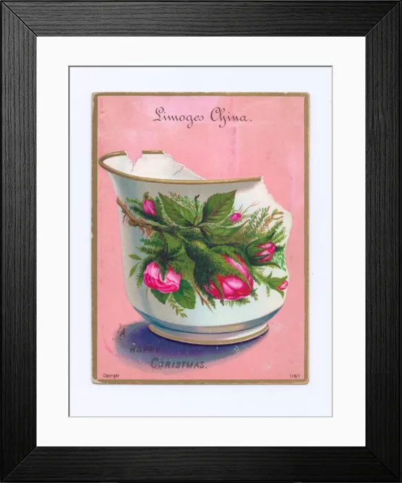 Framed Print : Broken Limoges China cup on a Christmas postcard Framed Print : Broken Limoges China cup on a Christmas postcard