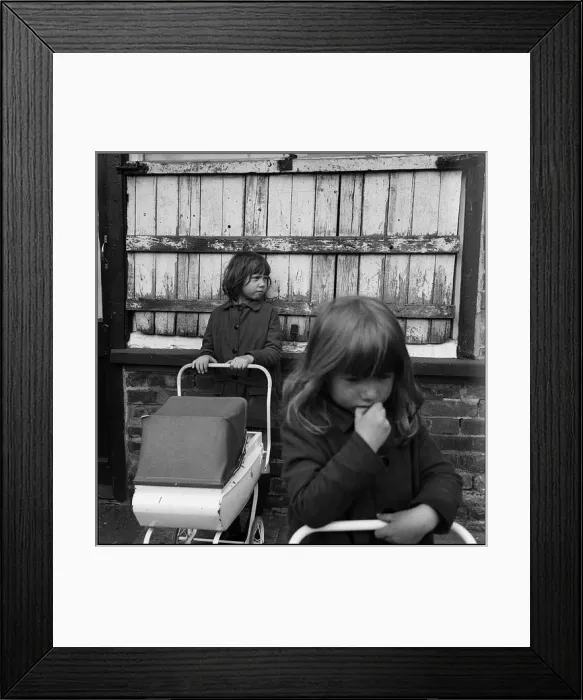 Framed Print : Chidren in the street with toy prams Framed Print : Chidren in the street with toy prams