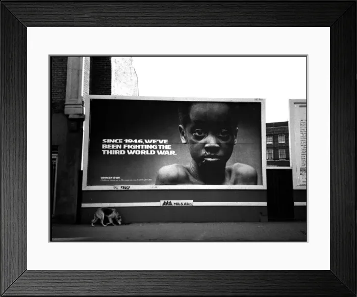 Framed Print : Poster for charity with sniffing dog on pavement London Framed Print : Poster for charity with sniffing dog on pavement London