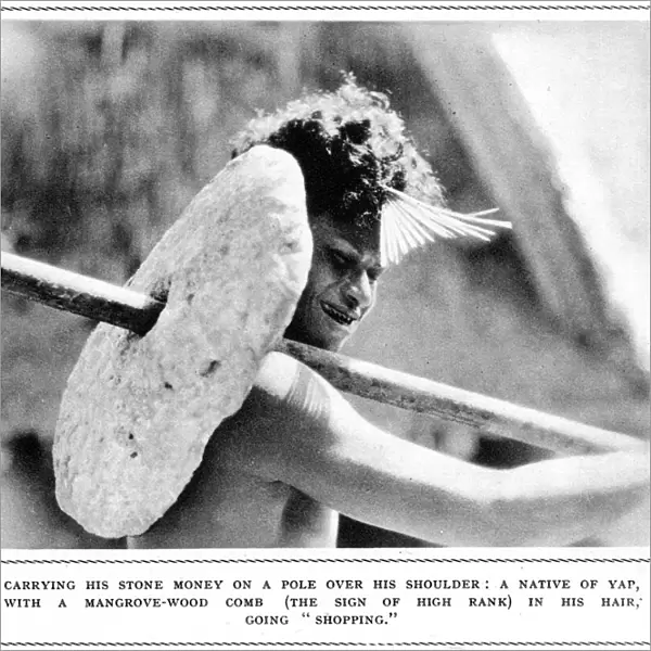Native of Yap carrying stone money