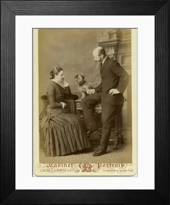 Framed Print : Studio portrait, couple with terrier dog Framed Print : Studio portrait, couple with terrier dog