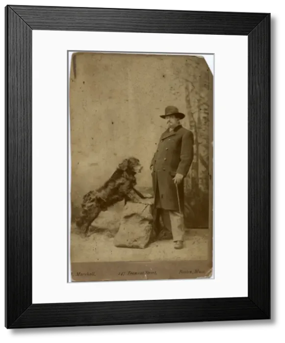 Framed Print : Studio portrait, man with his dog Framed Print : Studio portrait, man with his dog