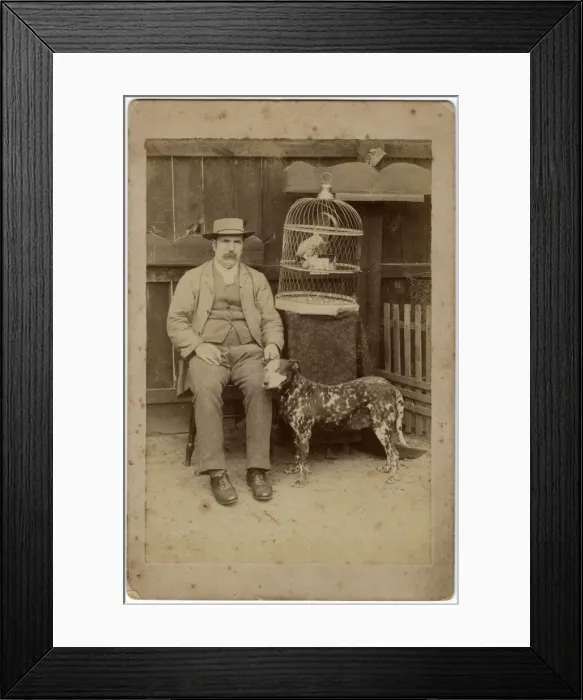 Framed Print : Man with dog and parrot Framed Print : Man with dog and parrot