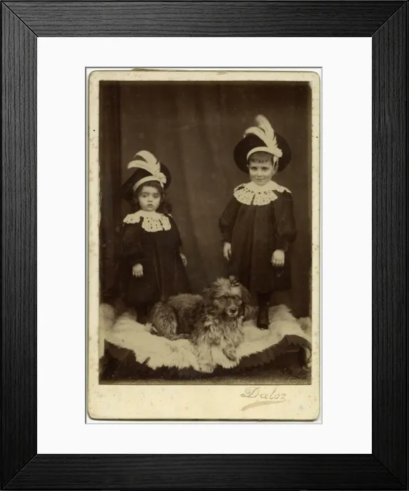 Framed Print : Studio portrait, two children with dog Framed Print : Studio portrait, two children with dog