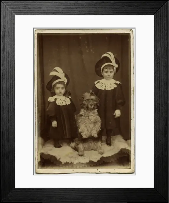 Framed Print : Studio portrait, two children with dog Framed Print : Studio portrait, two children with dog