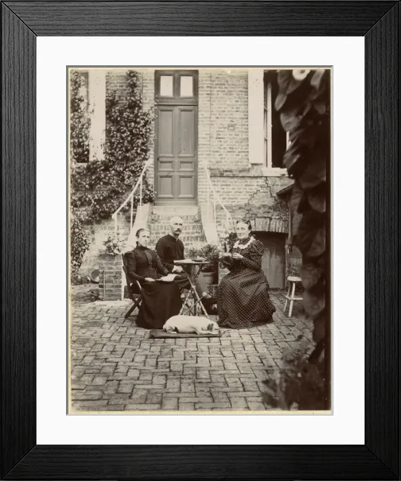 Framed Print : Three people with a dog in a garden Framed Print : Three people with a dog in a garden