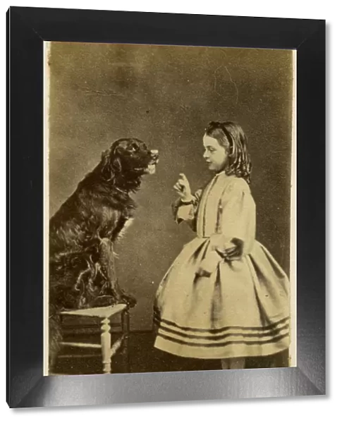 Victorian girl training her dog