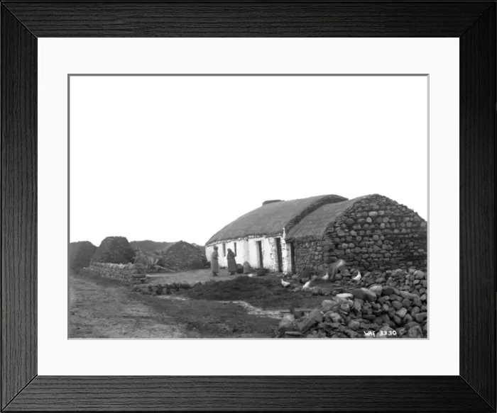 Framed Print : A farmyard scene with rope thatched buildings Framed Print : A farmyard scene with rope thatched buildings