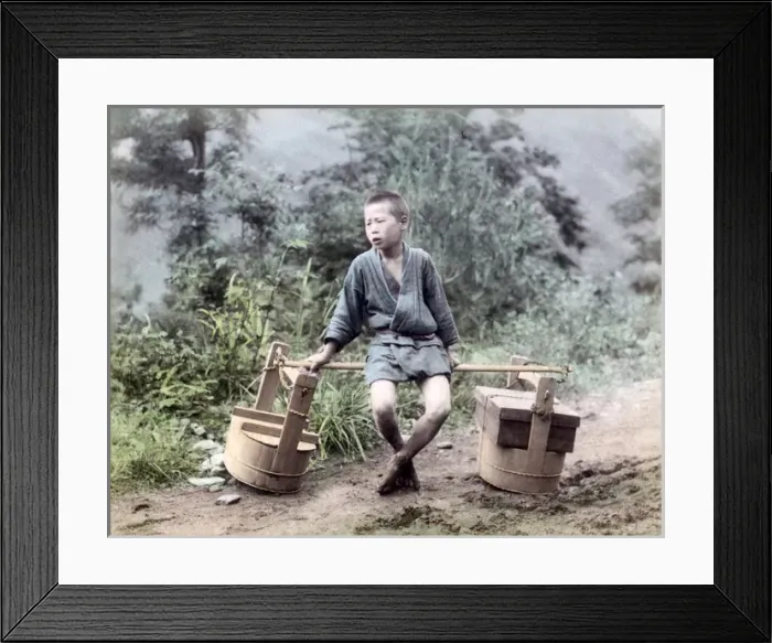 Framed Print : Child street vendor with baskets, Japan, circa 1880s Framed Print : Child street vendor with baskets, Japan, circa 1880s