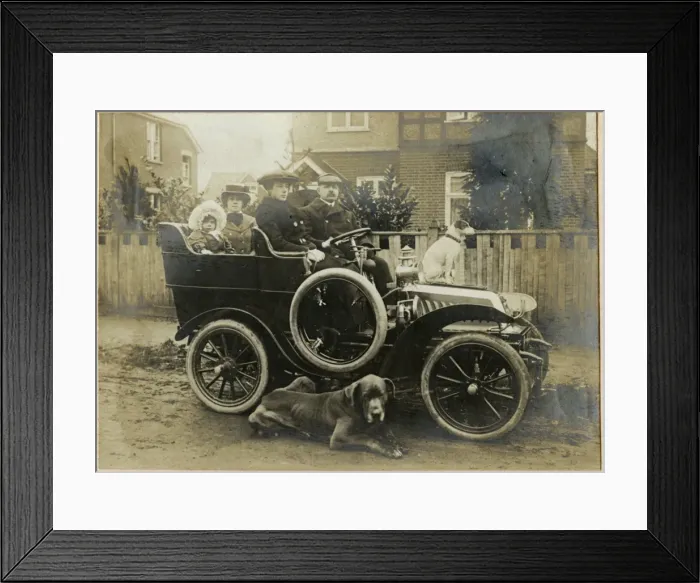 Framed Print : People in an early car with two dogs Framed Print : People in an early car with two dogs