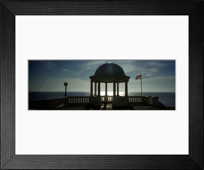 Framed Print : Seaside domed shelter with flag, Bexhill, England Framed Print : Seaside domed shelter with flag, Bexhill, England
