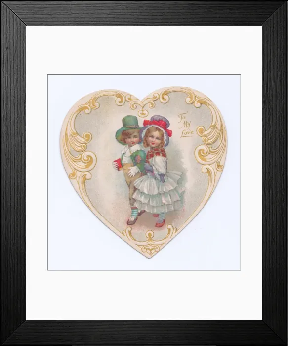 Framed Print : Boy and girl on a heart-shaped Valentines card Framed Print : Boy and girl on a heart-shaped Valentines card