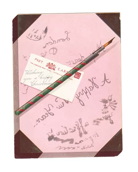 Christmas card with pink blotting paper, pen and postcard