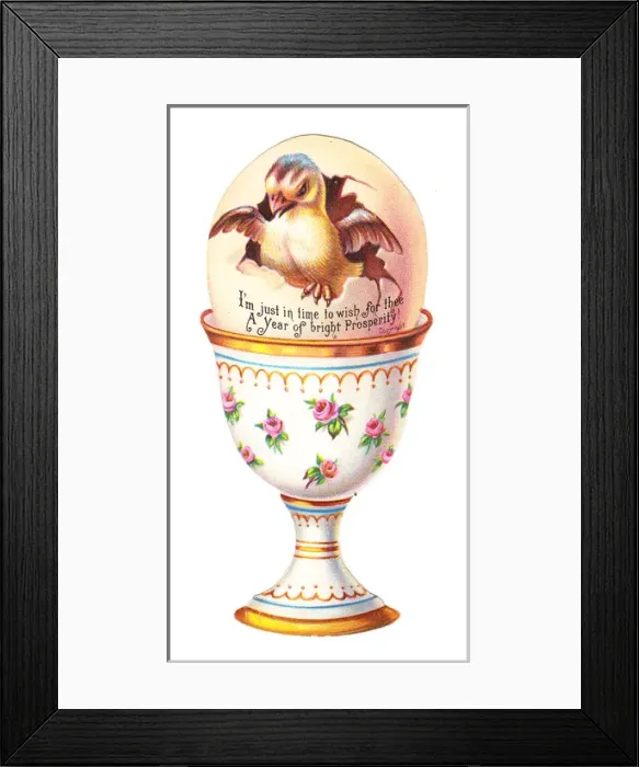 Framed Print : Chick in an eggcup on a cutout New Year card Framed Print : Chick in an eggcup on a cutout New Year card