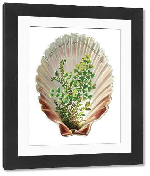 Green foliage in a shell-shaped Christmas card
