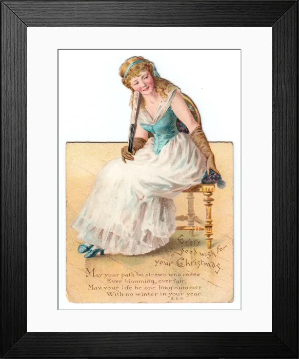 Framed Print : Seated woman with fan on a cutout Christmas card Framed Print : Seated woman with fan on a cutout Christmas card