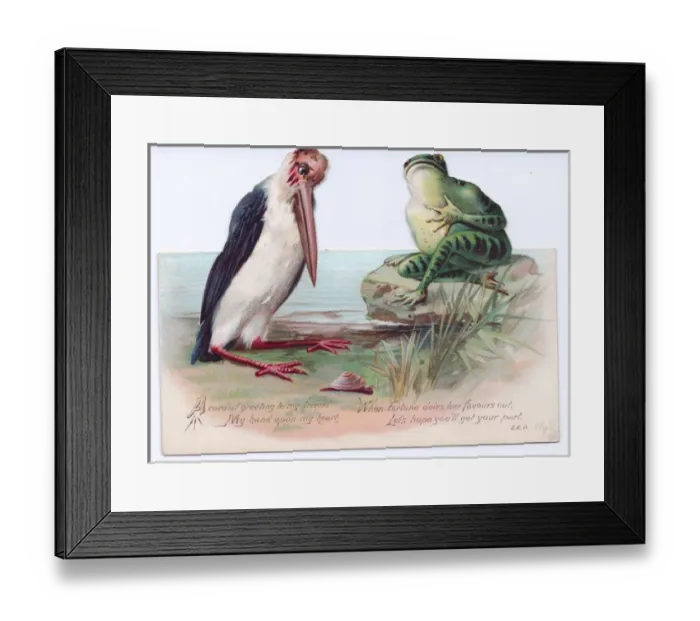 Framed Print : Frog and stork on a cutout Christmas card Framed Print : Frog and stork on a cutout Christmas card