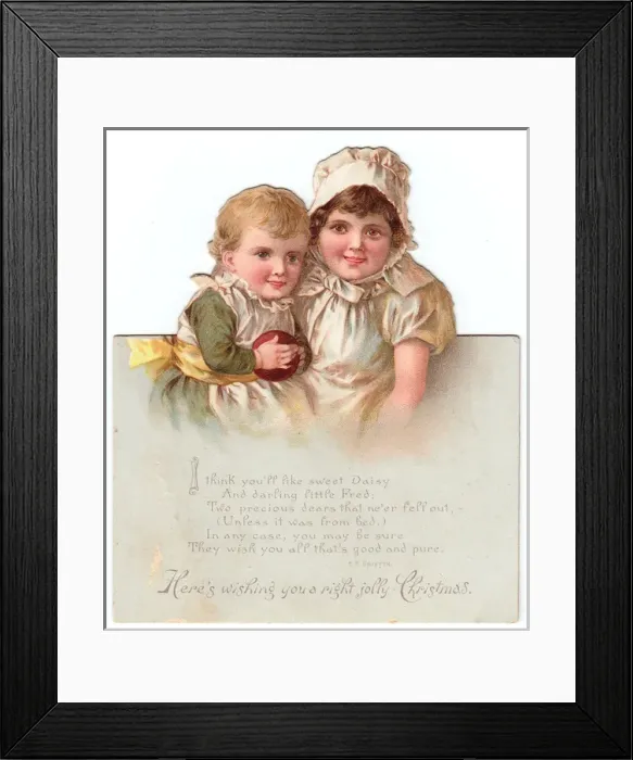 Framed Print : Girl and boy on a cutout Christmas card Framed Print : Girl and boy on a cutout Christmas card