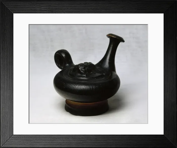 Framed Print : Askos. Central decoration embossed satyr head. Black varnish Framed Print : Askos. Central decoration embossed satyr head. Black varnish
