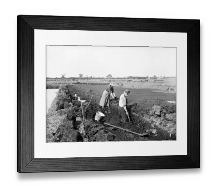 Framed Print : Digging Mud Turf in an Oul Bog Hole Co. Antrim