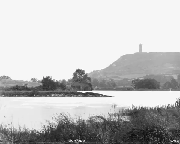 Scrabo - a view of the tower with water in the foreground