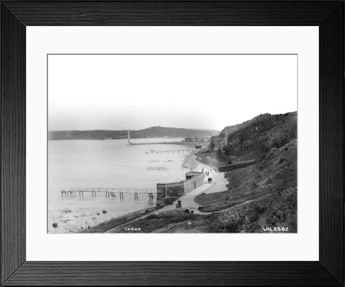 Framed Print : Larne - an elevated view looking down on the coastal walk with the bathing piers Framed Print : Larne - an elevated view looking down on the coastal walk with the bathing piers